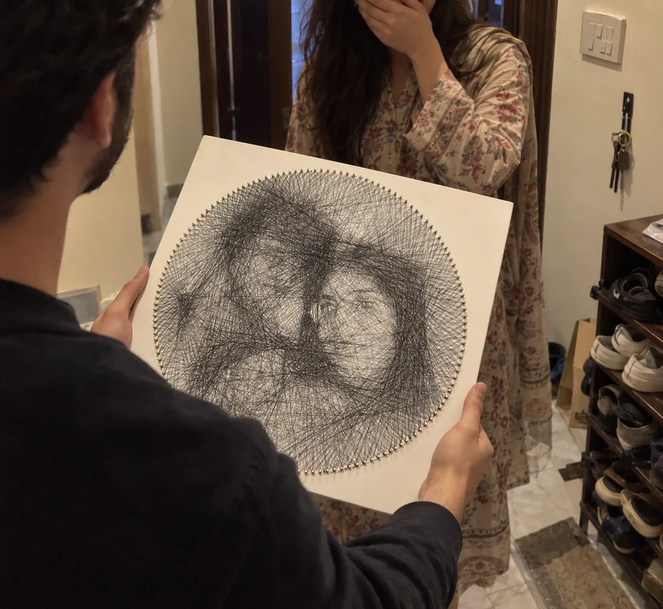 Surprising someone with a string art portrait he wove himself